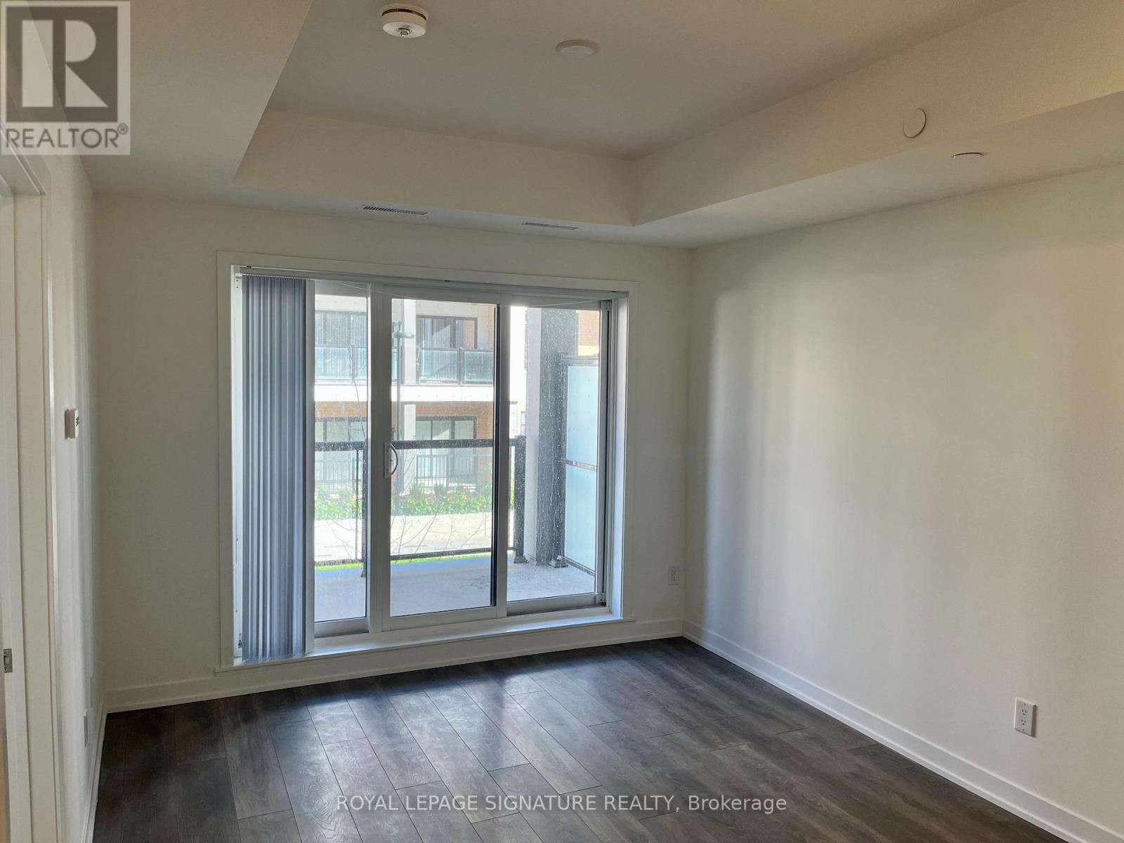 210 - 130 Canon Jackson Drive, Toronto, Ontario  M6M 0B7 - Photo 3 - W12210925