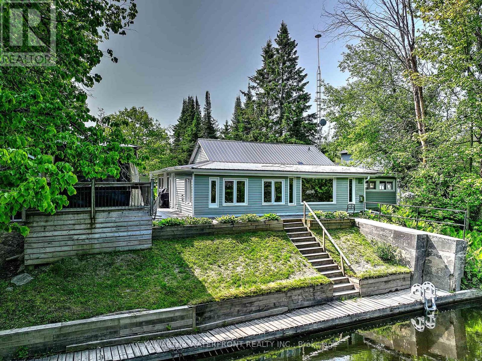 82 Kozy Kove Road, Kawartha Lakes, Ontario K0M 1C0 - Photo 1 - X12211053