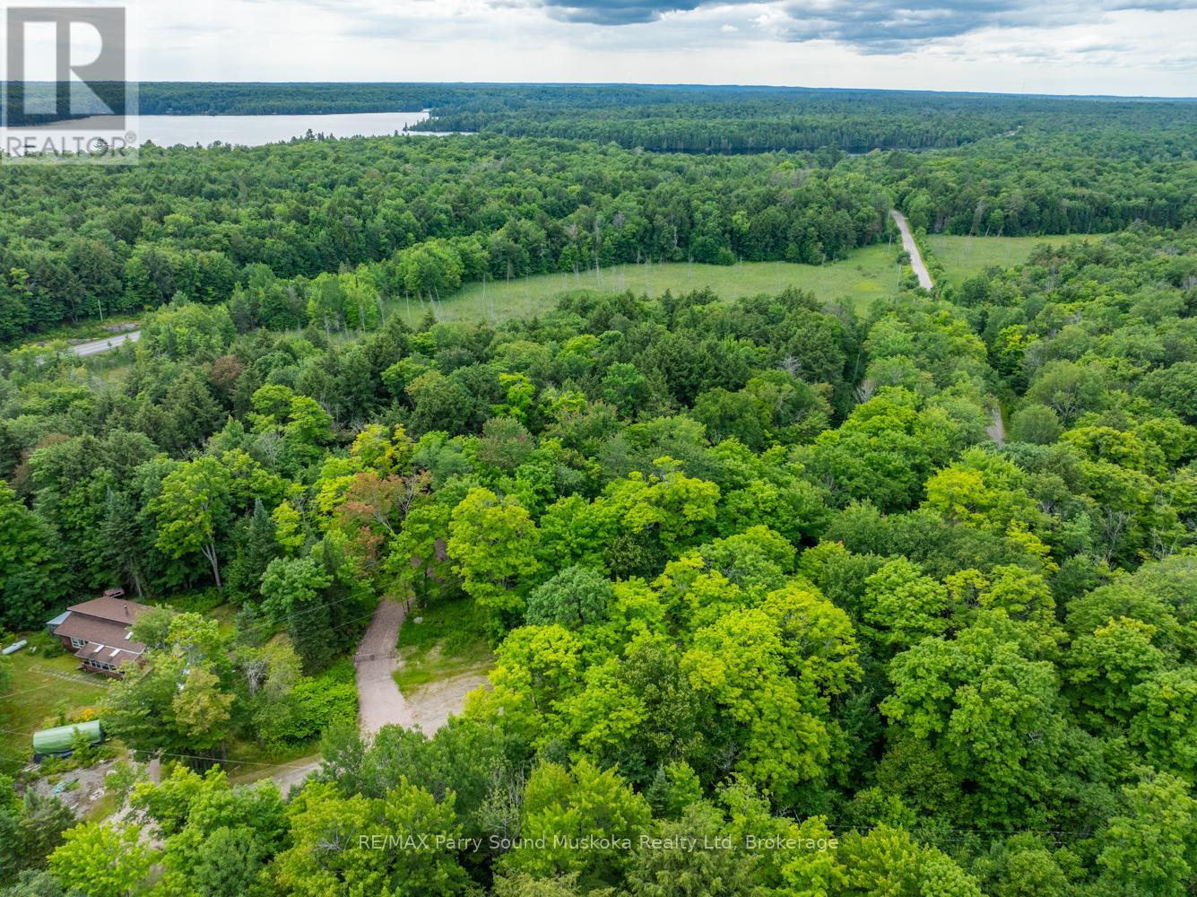 131 Moonwing Road, Magnetawan (Ahmic Harbour), Ontario  P0A 1A0 - Photo 2 - X12211059