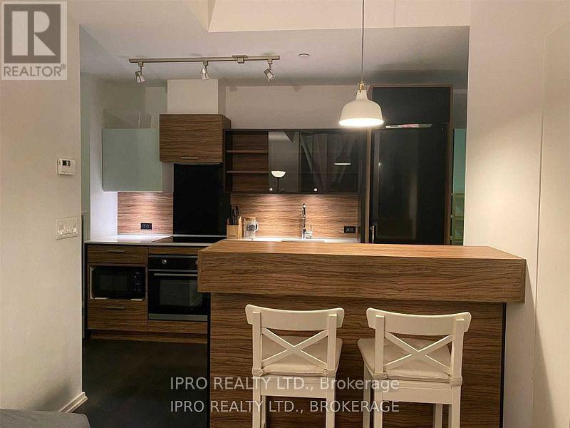 701 - 75 St Nicholas Street, Toronto (Bay Street Corridor), Ontario  M4Y 0A5 - Photo 3 - C12209591