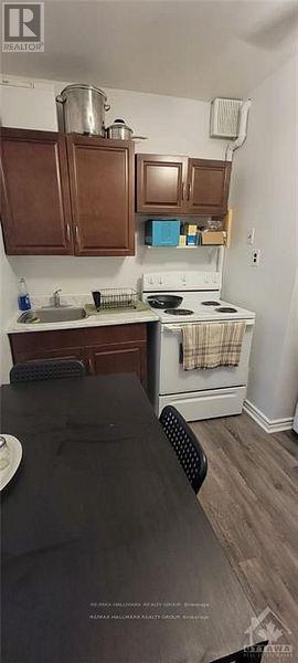 55 Douglas Avenue, Ottawa, Ontario  K1M 1G3 - Photo 4 - X12211135