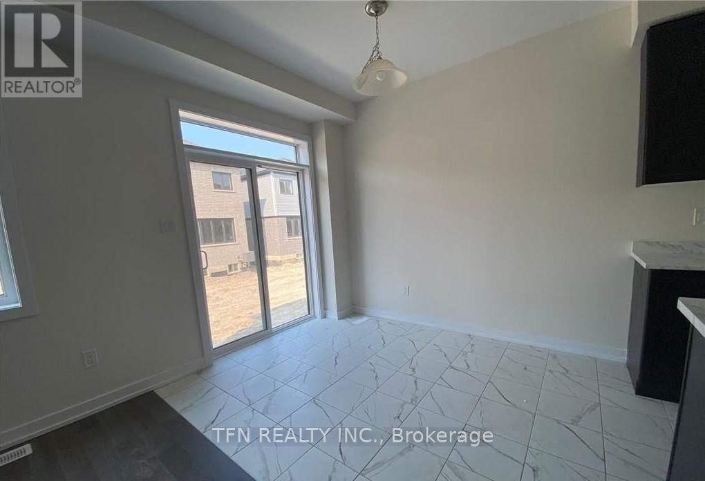 18 Monteith Drive, Brantford, Ontario  N3T 0W6 - Photo 4 - X12211125