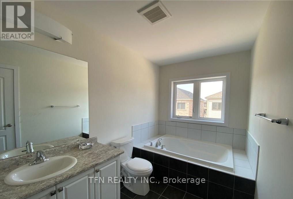 18 Monteith Drive, Brantford, Ontario  N3T 0W6 - Photo 9 - X12211125