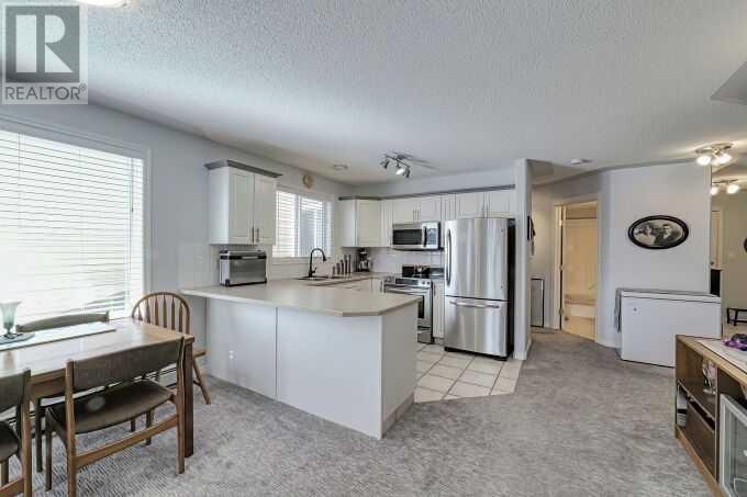 1212, 7451 Springbank Boulevard Sw, Calgary, Alberta  T3H 4K5 - Photo 5 - A2223359