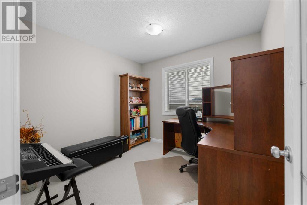 58 Everhollow Avenue Sw, Calgary, Alberta  T2Y 0A9 - Photo 12 - A2227890