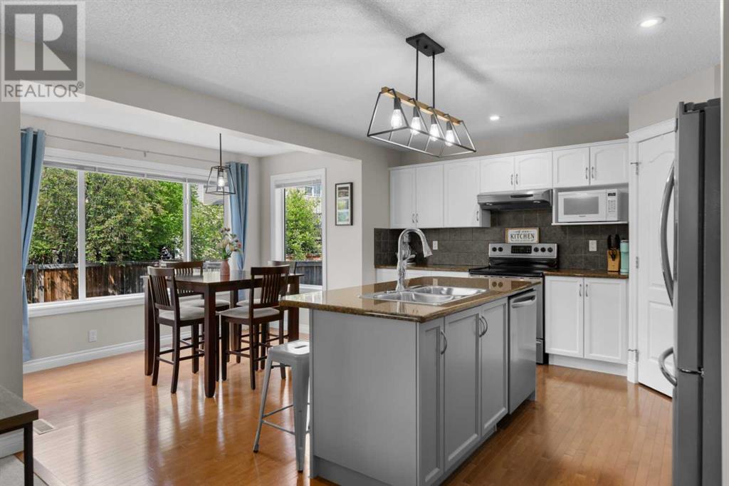 58 Everhollow Avenue Sw, Calgary, Alberta  T2Y 0A9 - Photo 7 - A2227890
