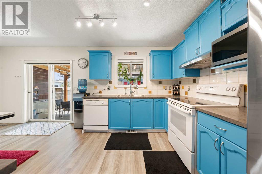 211 Bridlewood Avenue Sw, Calgary, Alberta  T2Y 4L2 - Photo 9 - A2222571