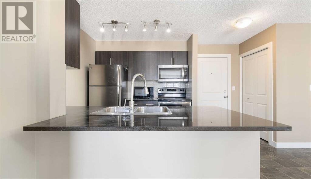 1410, 1317 27 Street Se, Calgary, Alberta  T2A 4Y5 - Photo 4 - A2229604