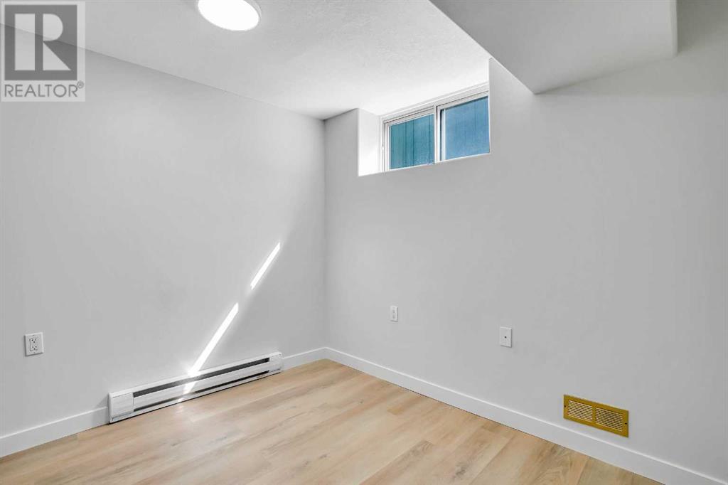 479 Berkley Crescent Nw, Calgary, Alberta  T3K 1A9 - Photo 24 - A2214697