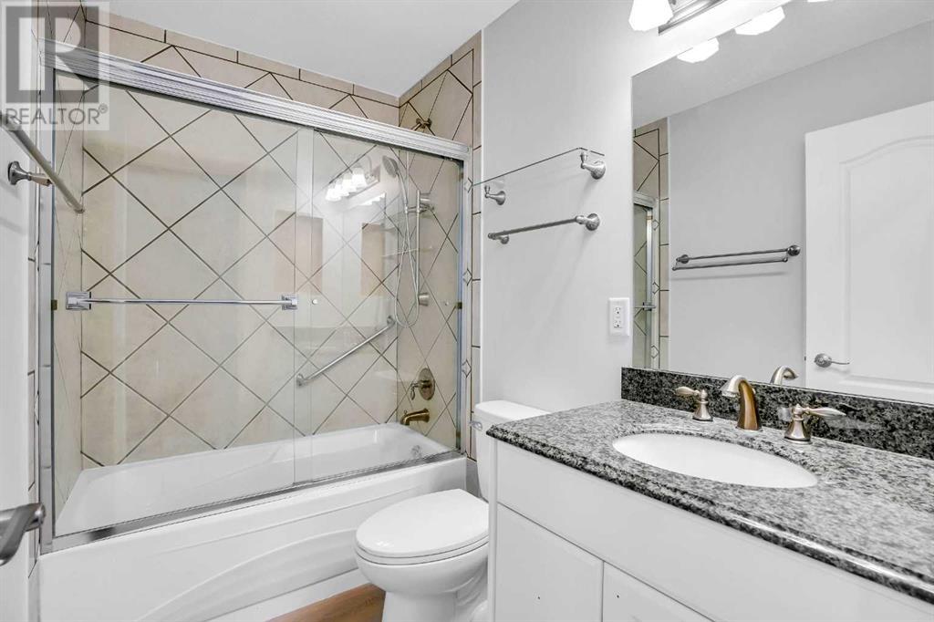479 Berkley Crescent Nw, Calgary, Alberta  T3K 1A9 - Photo 9 - A2214697