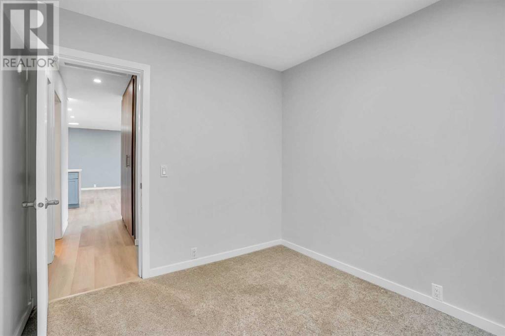 479 Berkley Crescent Nw, Calgary, Alberta  T3K 1A9 - Photo 5 - A2214697