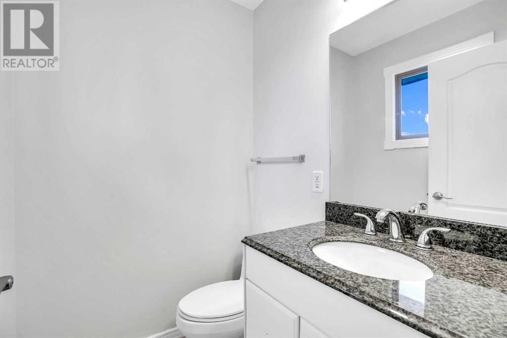 479 Berkley Crescent Nw, Calgary, Alberta  T3K 1A9 - Photo 8 - A2214697