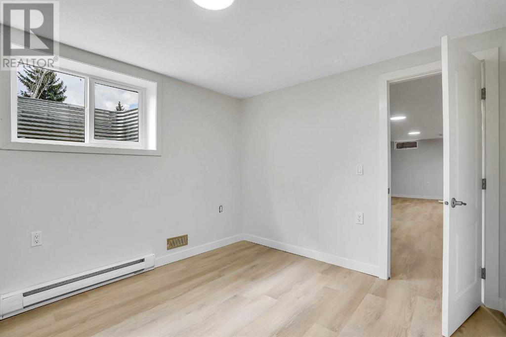 479 Berkley Crescent Nw, Calgary, Alberta  T3K 1A9 - Photo 36 - A2214697