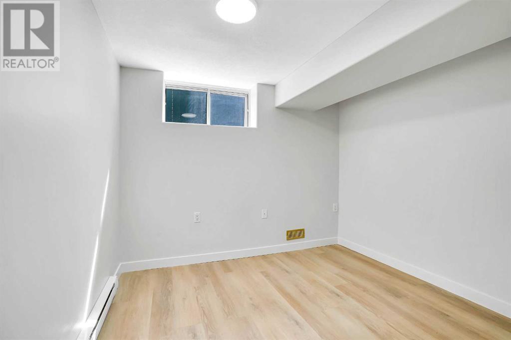479 Berkley Crescent Nw, Calgary, Alberta  T3K 1A9 - Photo 23 - A2214697