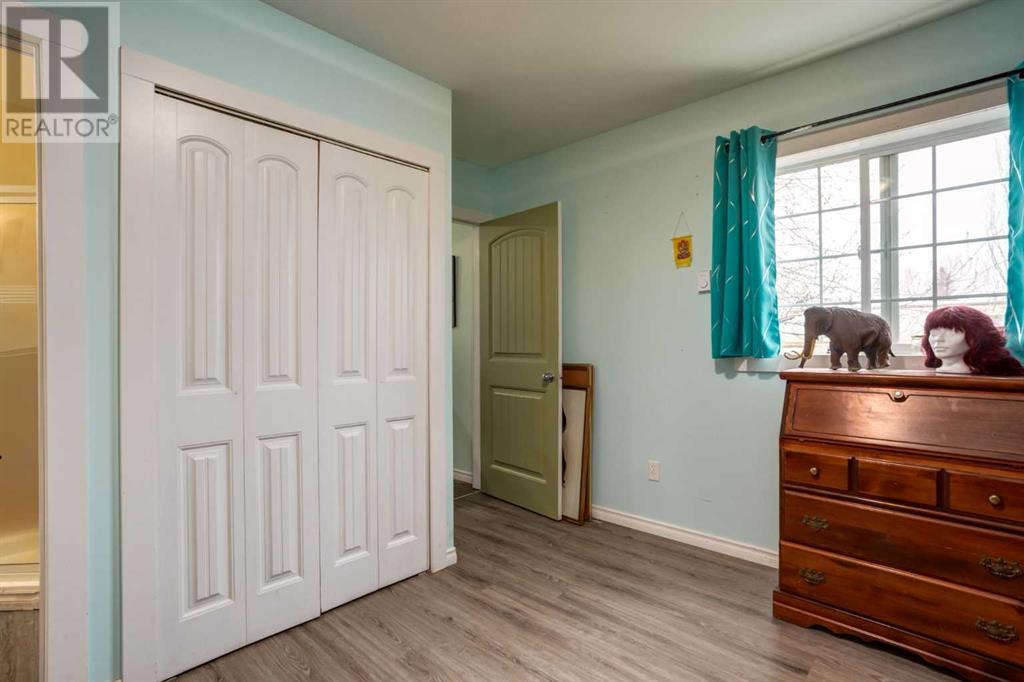 223 Huntwell Road Ne, Calgary, Alberta  T2K 5V4 - Photo 18 - A2216042