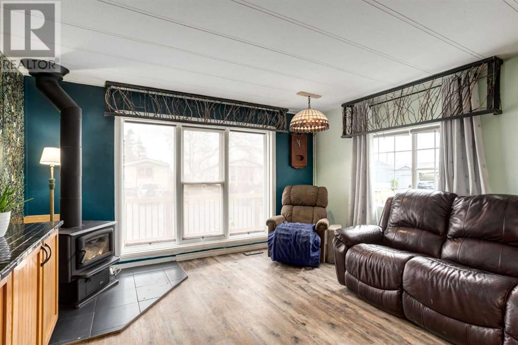 223 Huntwell Road Ne, Calgary, Alberta  T2K 5V4 - Photo 7 - A2216042