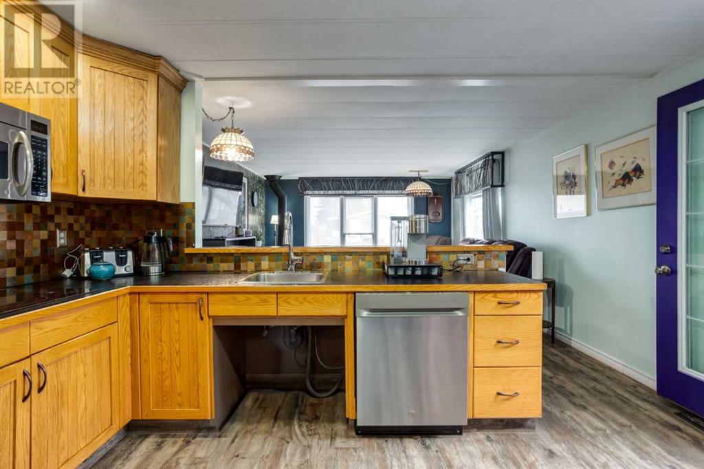 223 Huntwell Road Ne, Calgary, Alberta  T2K 5V4 - Photo 5 - A2216042