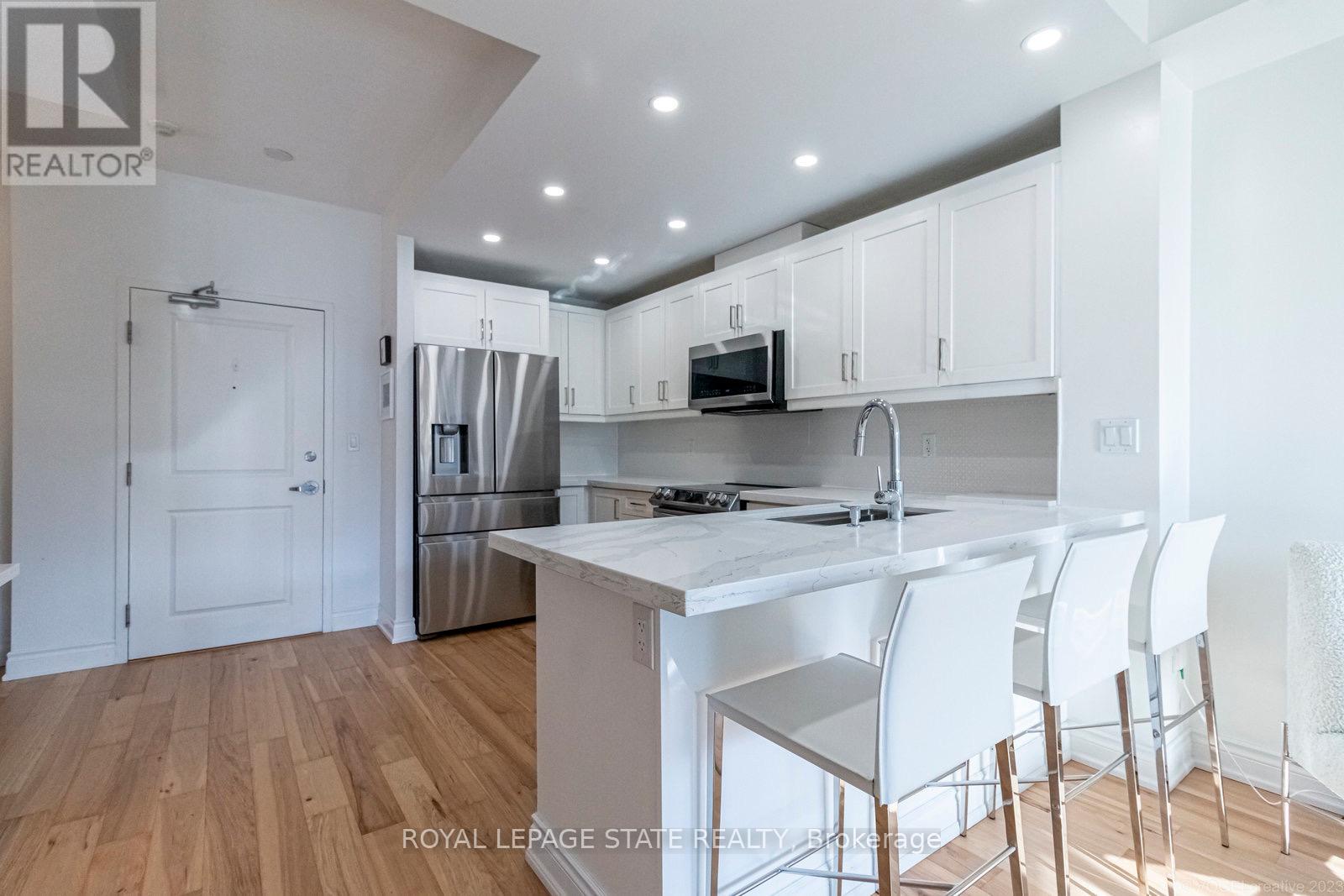 310 - 125 Wilson Street W, Hamilton (Ancaster), Ontario  L9G 0B3 - Photo 18 - X12211355
