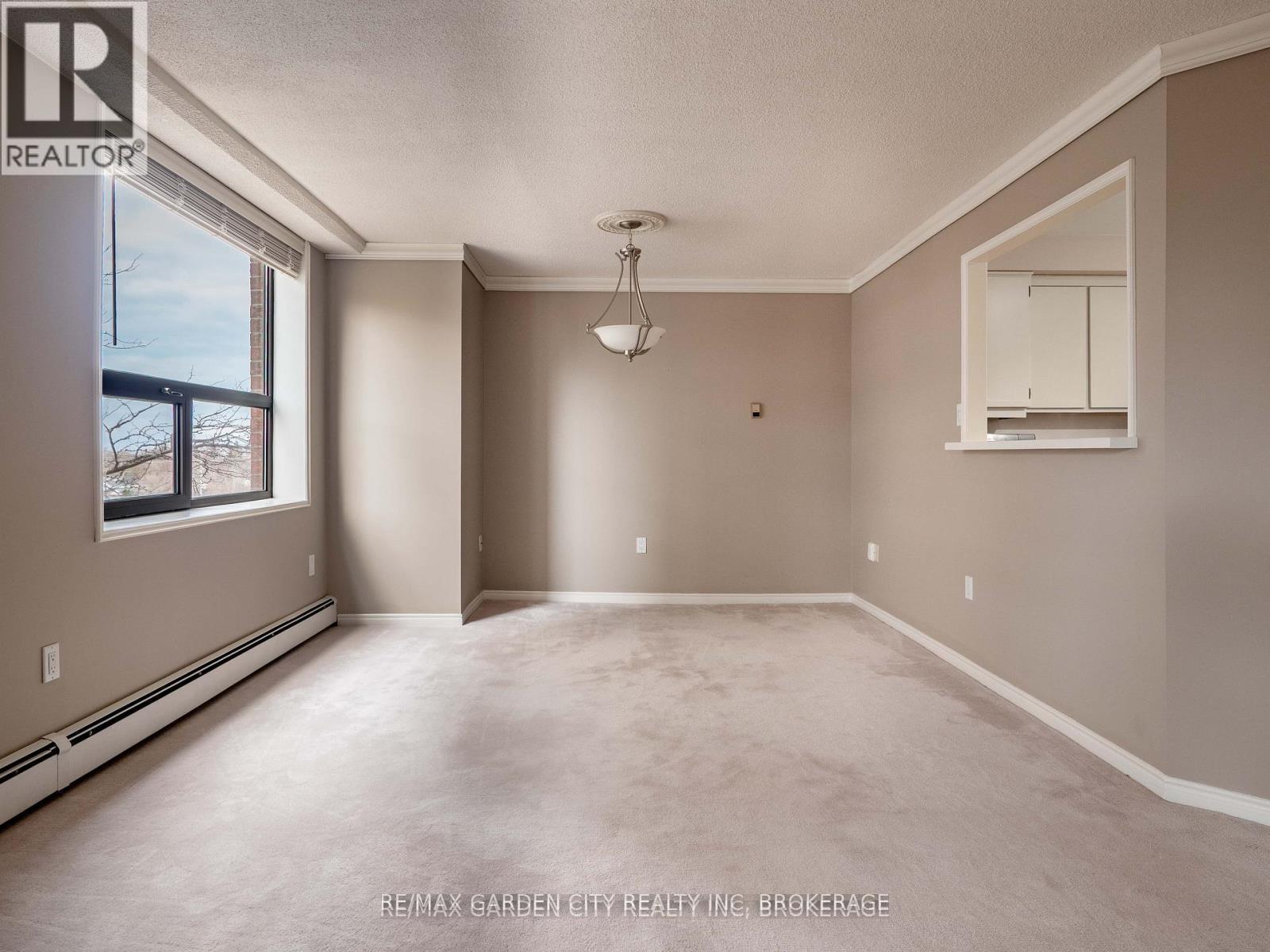304 - 141 Church Street, St. Catharines (Downtown), Ontario  L2R 7L7 - Photo 6 - X12211472