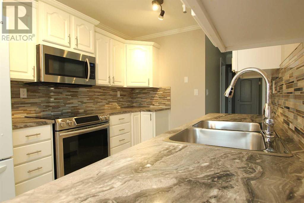 52 Mclevin Crescent, Red Deer, Alberta  T4R 1S9 - Photo 3 - A2229313