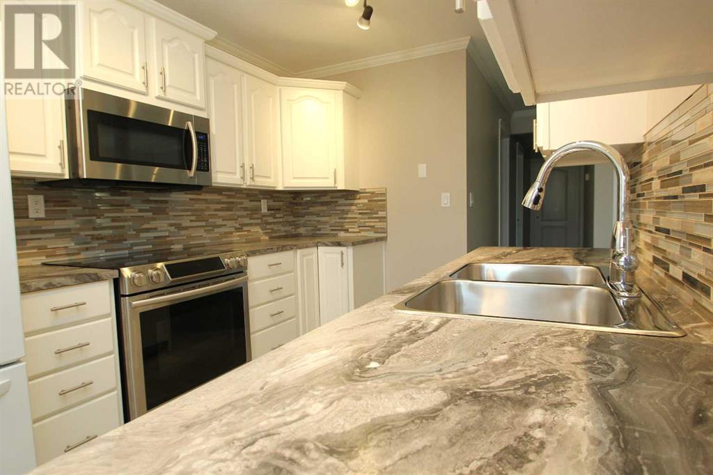 52 Mclevin Crescent, Red Deer, Alberta  T4R 1S9 - Photo 5 - A2229313