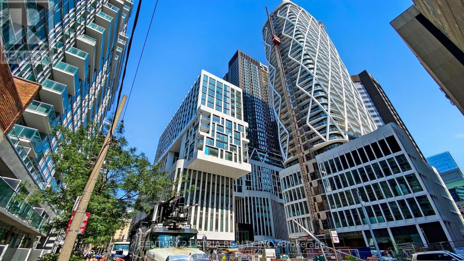 1310 - 238 Simcoe Street, Toronto, Ontario  M5T 0E2 - Photo 1 - C12211602
