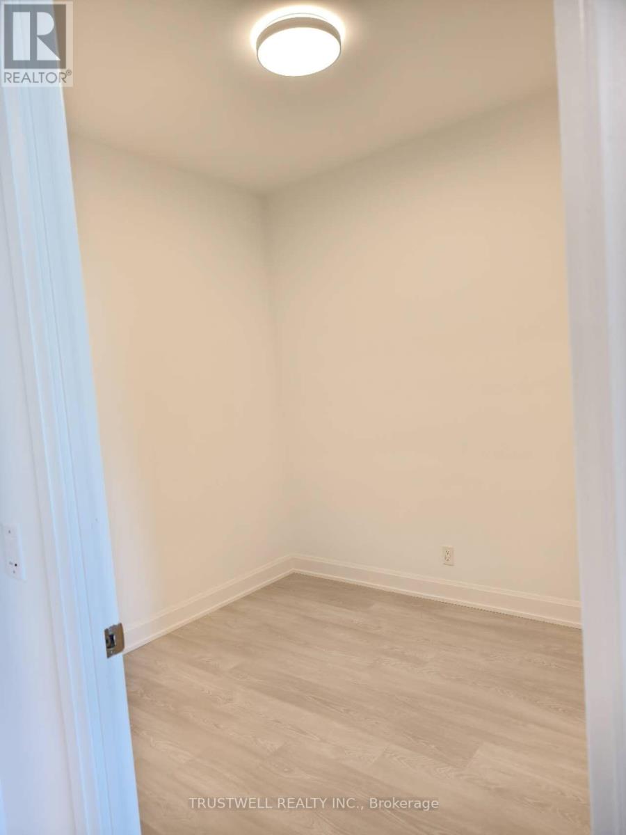 315 - 38 Water Walk Drive, Markham, Ontario  L3R 6M8 - Photo 8 - N12211612