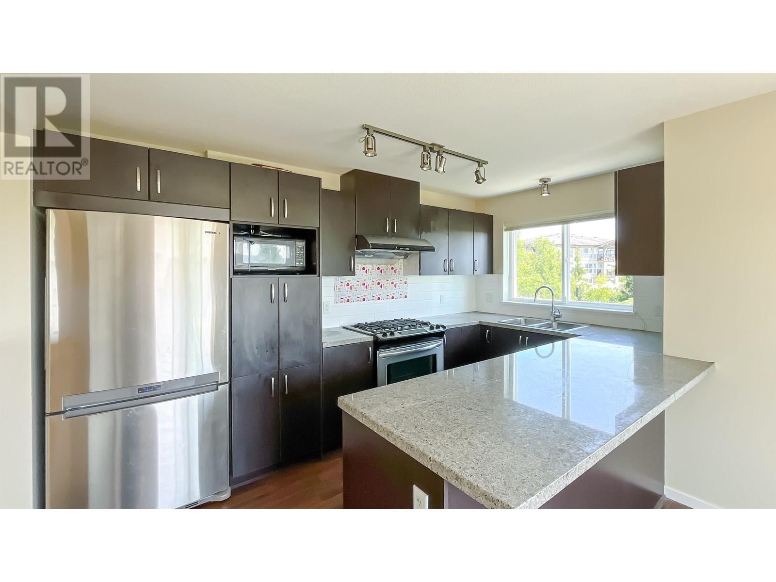 203 3050 DAYANEE SPRINGS BOULEVARD, Coquitlam, British Columbia