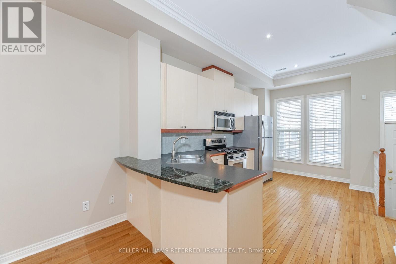 13 Joseph Salsberg Lane, Toronto (Niagara), Ontario  M6J 3W8 - Photo 5 - C12212176