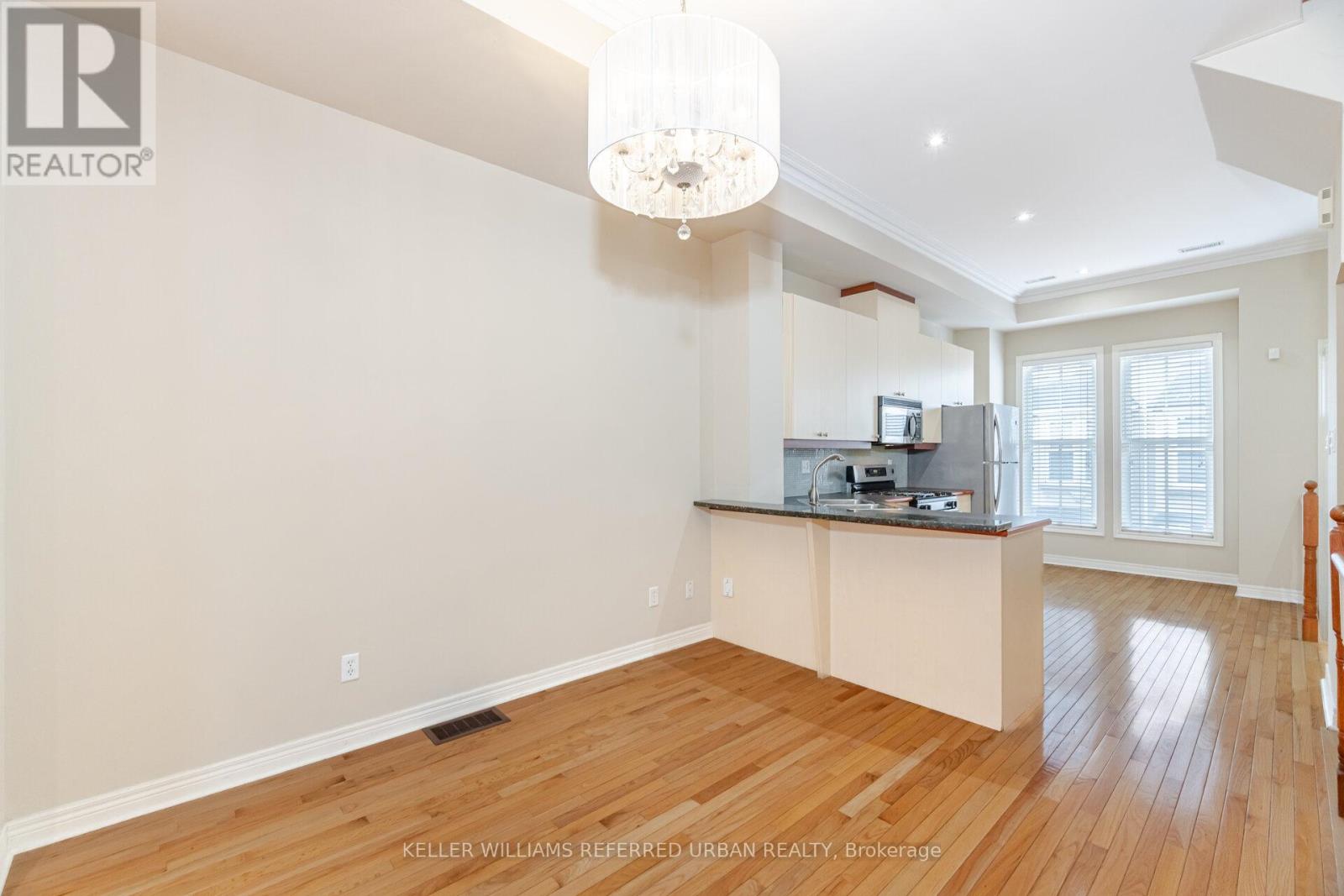 13 Joseph Salsberg Lane, Toronto (Niagara), Ontario  M6J 3W8 - Photo 8 - C12212176