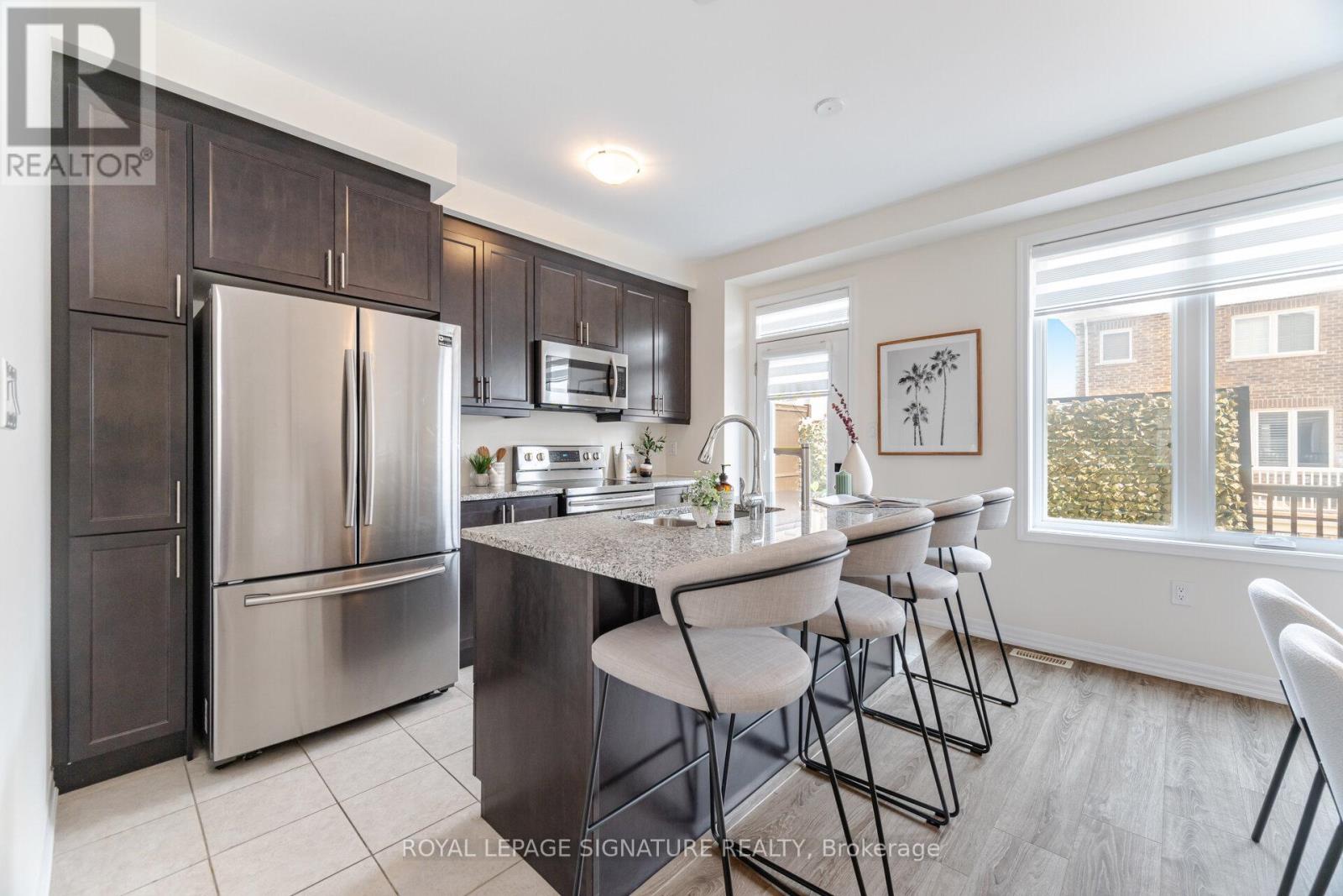 242 Harold Dent Trail, Oakville (Go Glenorchy), Ontario  L6M 1S2 - Photo 15 - W12212025