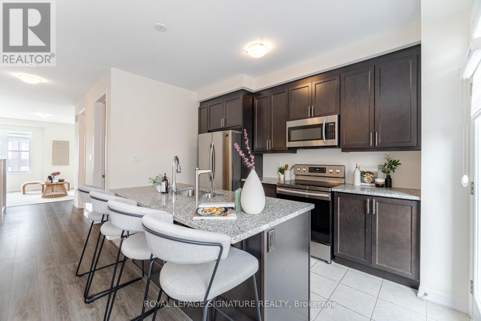 242 Harold Dent Trail, Oakville (Go Glenorchy), Ontario  L6M 1S2 - Photo 16 - W12212025