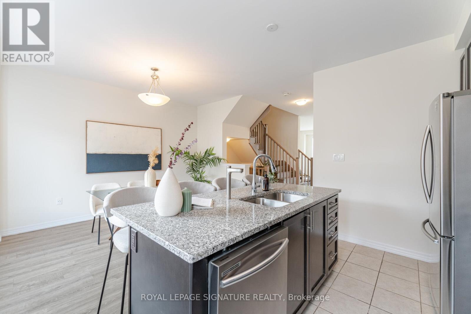 242 Harold Dent Trail, Oakville (Go Glenorchy), Ontario  L6M 1S2 - Photo 18 - W12212025