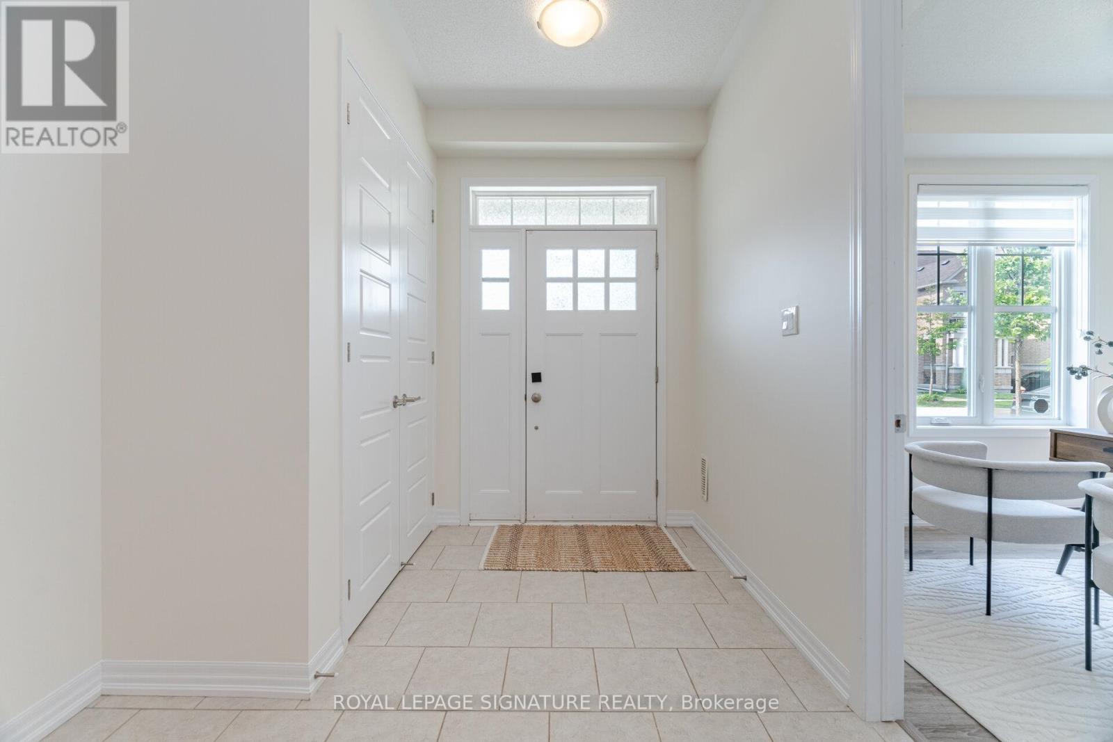 242 Harold Dent Trail, Oakville (Go Glenorchy), Ontario  L6M 1S2 - Photo 4 - W12212025