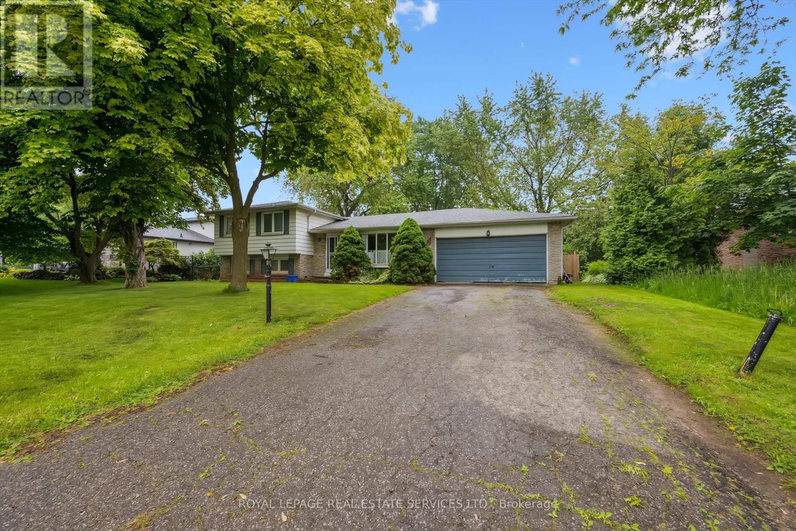 2138 Rebecca Street, Oakville, Ontario  L6L 2A5 - Photo 2 - W12212074