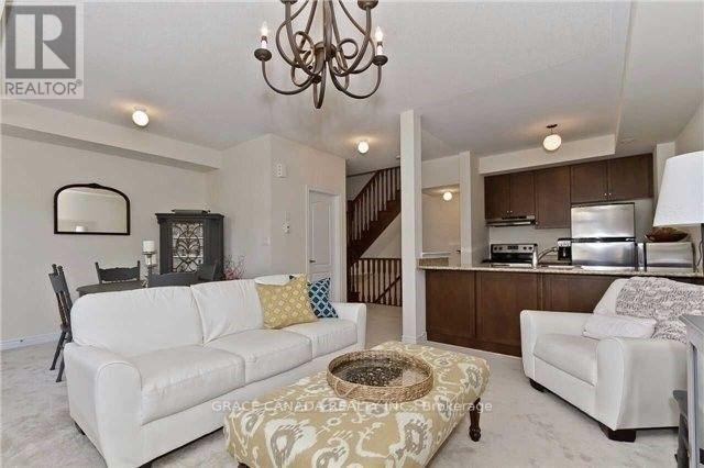 9 - 2435 Greenwich Drive, Oakville, Ontario  L6M 0S4 - Photo 2 - W12212312