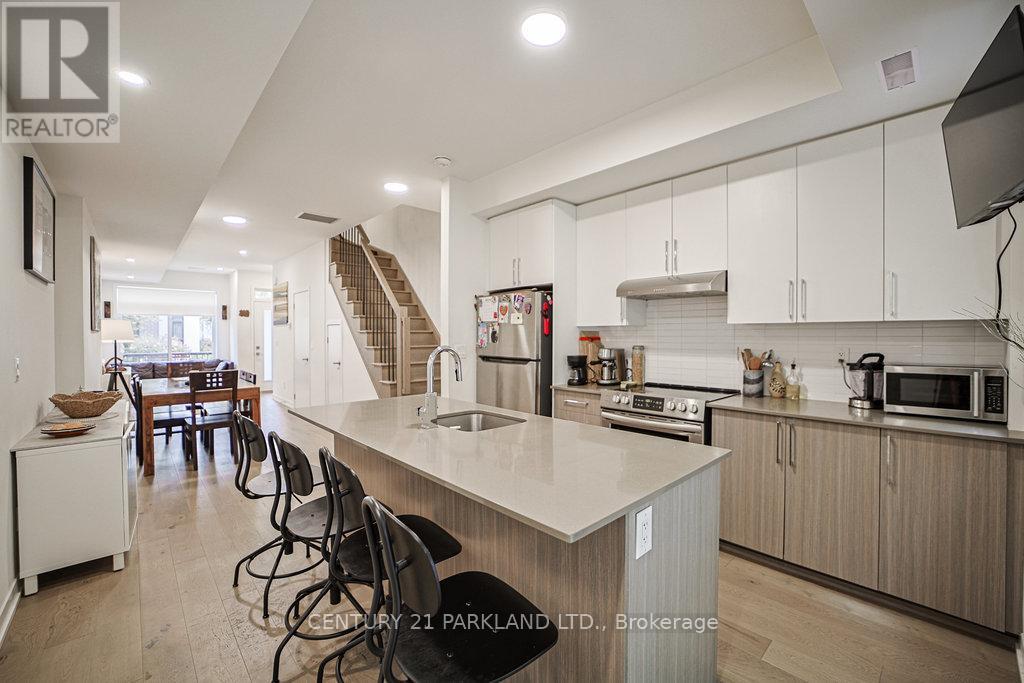102 - 110 Canon Jackson Drive, Toronto (Brookhaven-Amesbury), Ontario  M6M 3Z4 - Photo 4 - W12212406