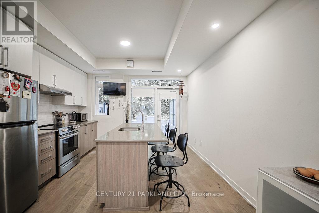 102 - 110 Canon Jackson Drive, Toronto (Brookhaven-Amesbury), Ontario  M6M 3Z4 - Photo 5 - W12212406