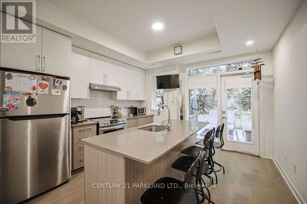 102 - 110 Canon Jackson Drive, Toronto (Brookhaven-Amesbury), Ontario  M6M 3Z4 - Photo 6 - W12212406