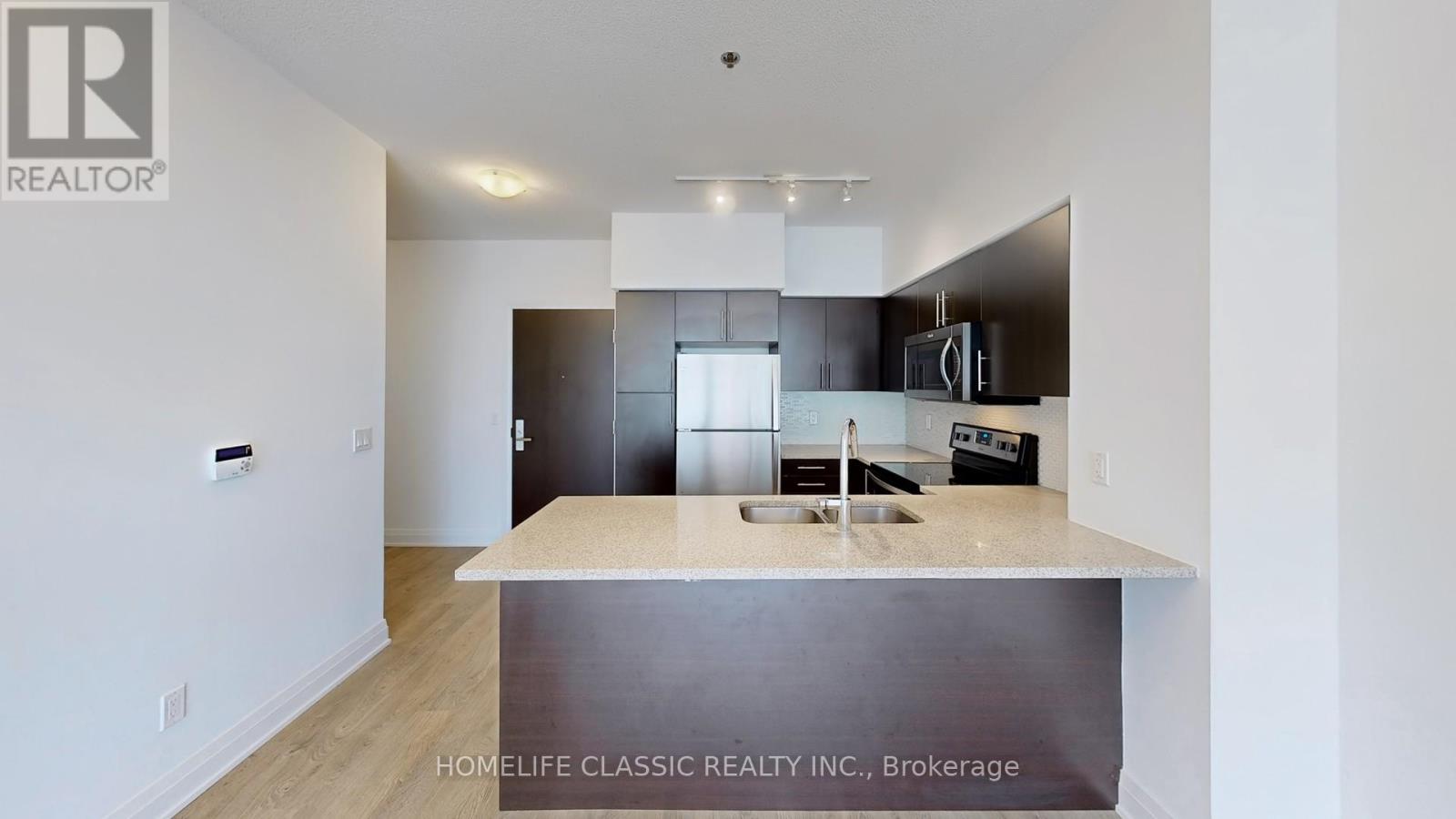 507 - 55 Speers Road, Oakville (Qe Queen Elizabeth), Ontario  L6K 0H9 - Photo 4 - W12212573