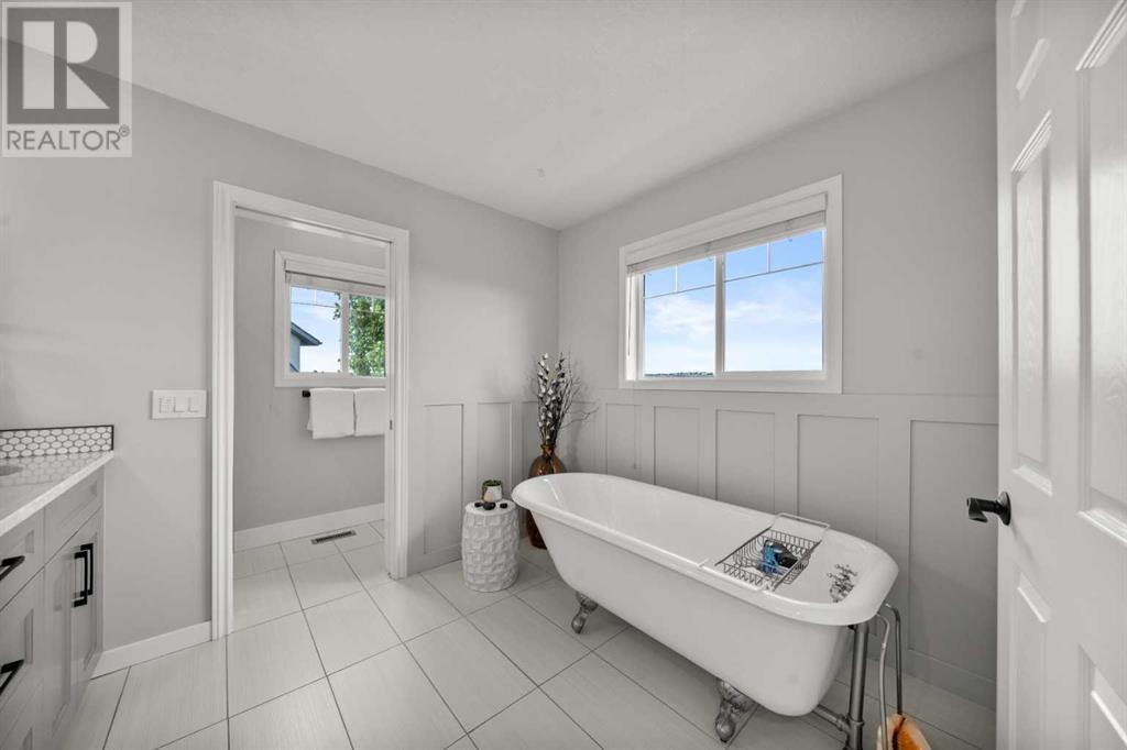 87 Hidden Creek Point Nw, Calgary, Alberta  T2A 6J7 - Photo 25 - A2227150