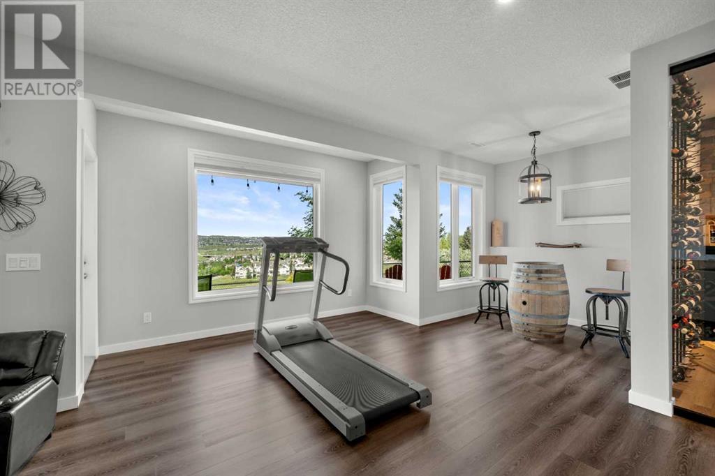 87 Hidden Creek Point Nw, Calgary, Alberta  T2A 6J7 - Photo 33 - A2227150