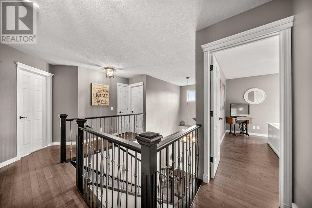 87 Hidden Creek Point Nw, Calgary, Alberta  T2A 6J7 - Photo 17 - A2227150
