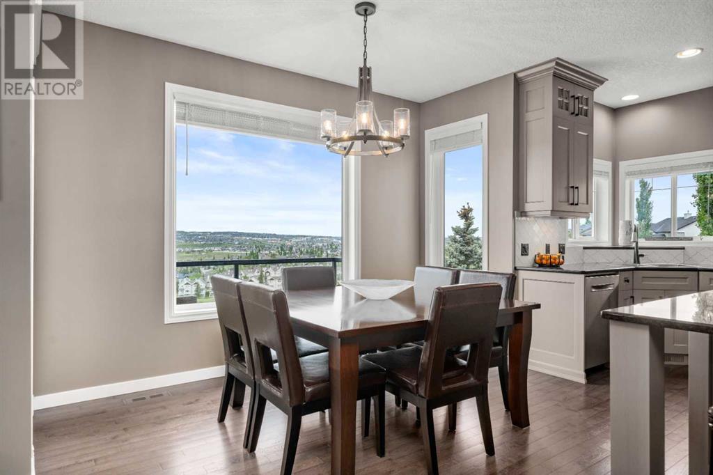87 Hidden Creek Point Nw, Calgary, Alberta  T2A 6J7 - Photo 8 - A2227150