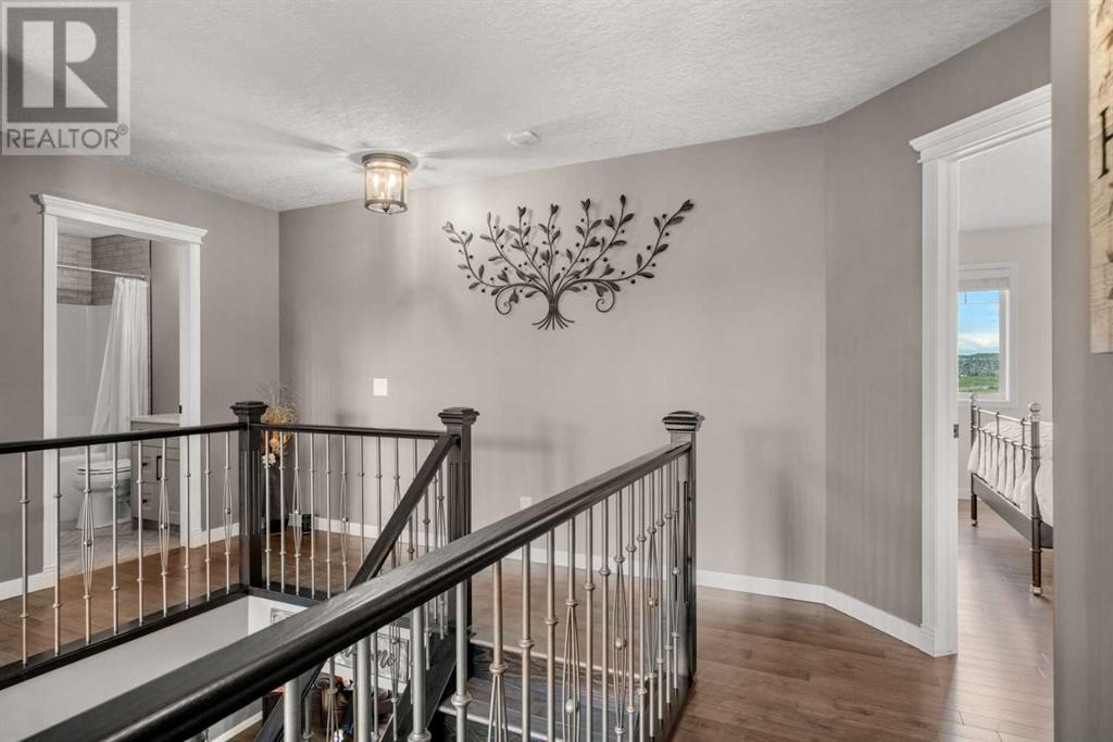 87 Hidden Creek Point Nw, Calgary, Alberta  T2A 6J7 - Photo 21 - A2227150