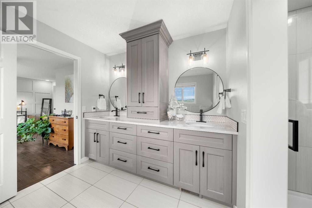87 Hidden Creek Point Nw, Calgary, Alberta  T2A 6J7 - Photo 26 - A2227150