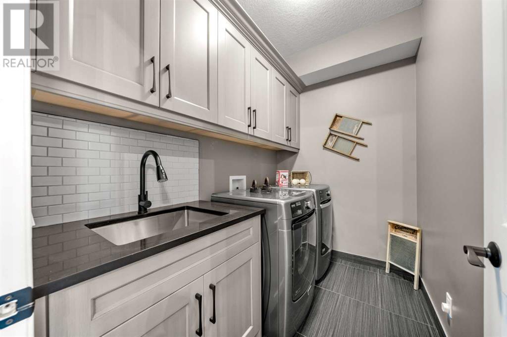 87 Hidden Creek Point Nw, Calgary, Alberta  T2A 6J7 - Photo 13 - A2227150