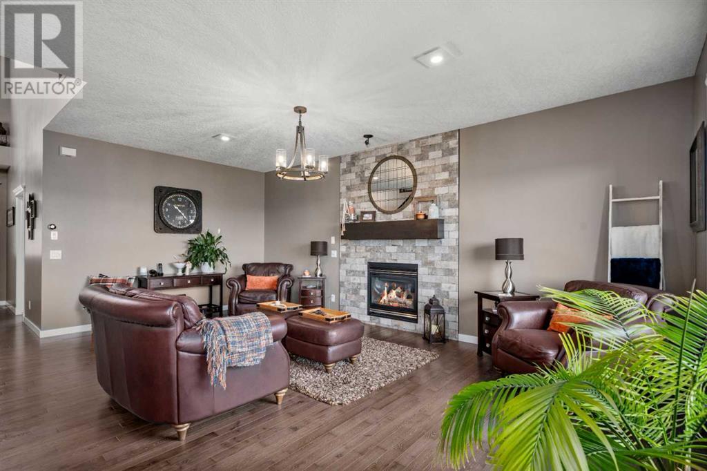 87 Hidden Creek Point Nw, Calgary, Alberta  T2A 6J7 - Photo 5 - A2227150