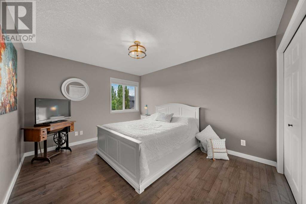 87 Hidden Creek Point Nw, Calgary, Alberta  T2A 6J7 - Photo 19 - A2227150