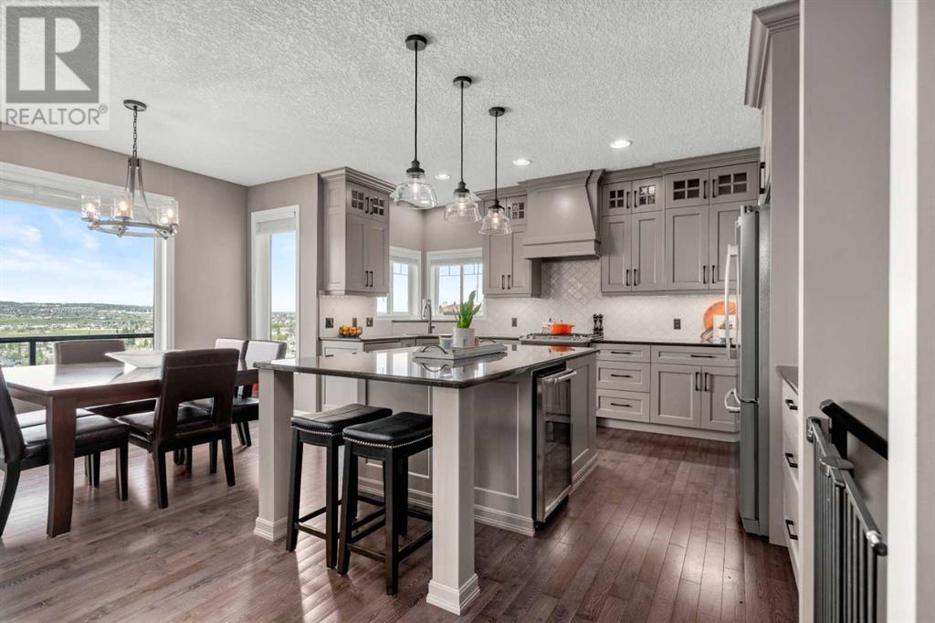 87 Hidden Creek Point Nw, Calgary, Alberta  T2A 6J7 - Photo 9 - A2227150
